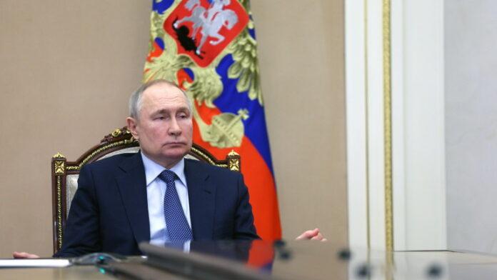 Russian President Putin chairs a Security Council meeting via video link