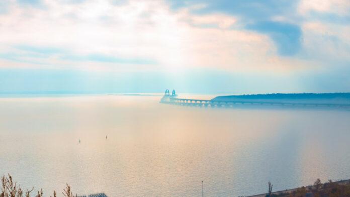 Beautiful bridge in the sea in the morning at sunrise Seascape